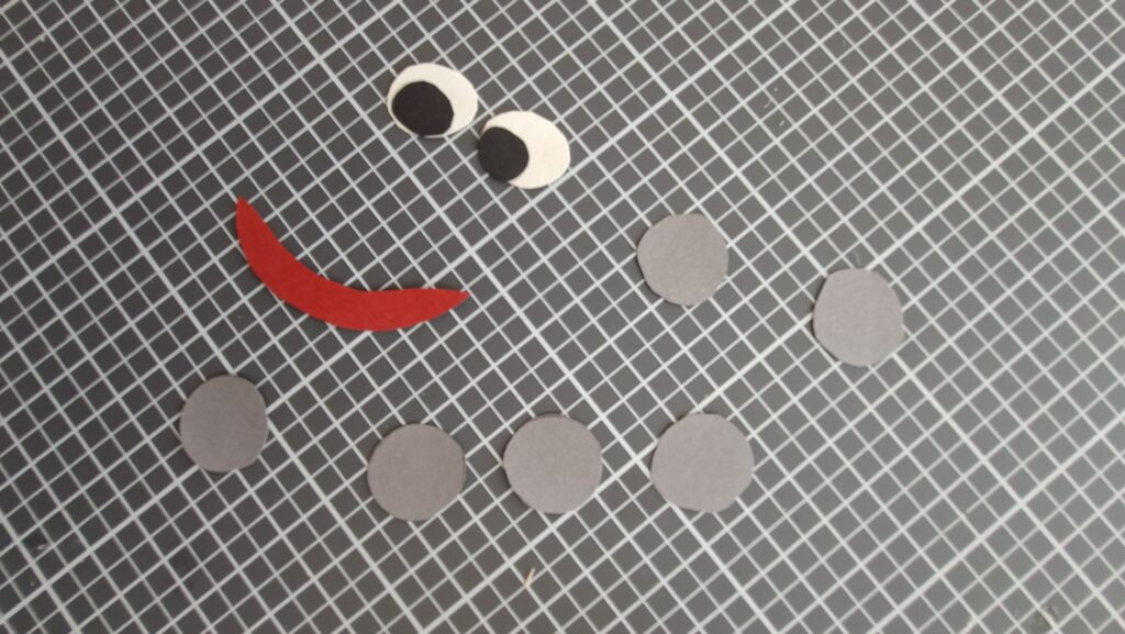 Augen, Lippen, Knöpfe